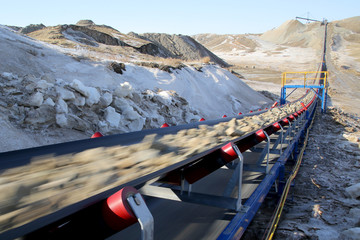 Industrial conveyor belt moves ore from a quarry