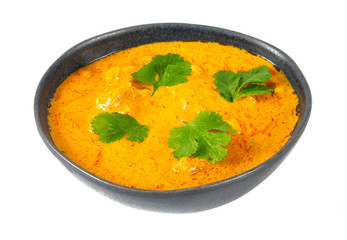 chicken curry in a bowl isolated on white