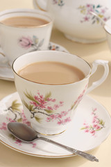 English afternoon tea served in floral porcelain cups