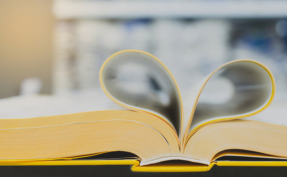 Open the book, make the heart shape.