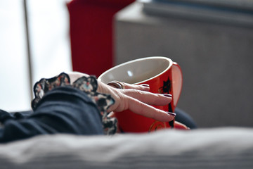 woman with a coffee cup