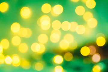 Christmas background. Festive abstract background with bokeh defocused lights and stars