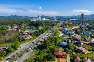 Aerial drone image of beautiful rural town local lifestyle houses residential of Menggatal Town, Sabah, Malaysia