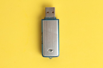 Side view of silver USB memory stick  on white