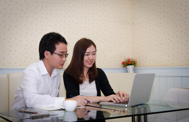 Young couple using laptop computer and work on project business. - 300657309
