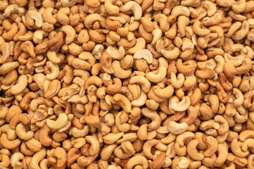 Cashew nuts as food background, top view