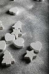 Grey concrete background with Christmas decorations. Space for text. Holidays.