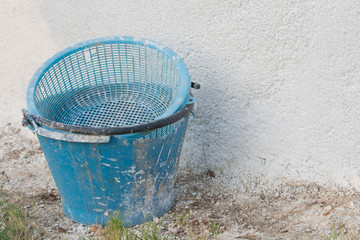 concrete dirty on blue bucket 