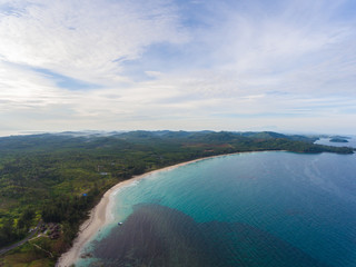 Aerial drone image of Beautiful white sandy beach with turquoise sea water beach at Kudat, Sabah,...