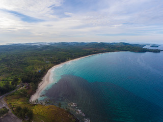 Aerial drone image of Beautiful white sandy beach with turquoise sea water beach at Kudat, Sabah,...