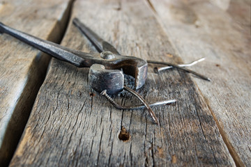 Tongs and bent nails