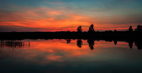 Red sunset on the lake