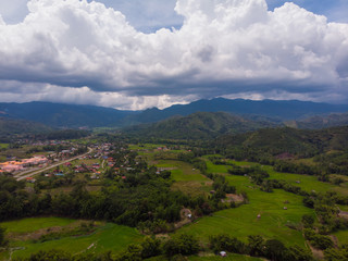 Obraz premium Aerial image of beautiful nature landscape with green paddy field.