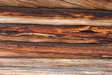 Old antique, rustic, golden and weathered wooden boards on barn. Texture and pattern concept.