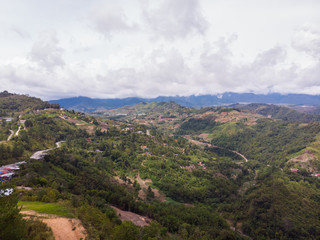 Obraz premium Beautiful Aerial drone image of rural landscape with a field and house 