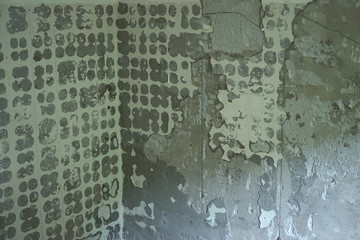 Wall after tiles are taken away.