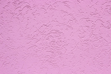 Pink stucco, wall decoration, background backdrop texture. Rough concrete wall surface with colored plaster coating