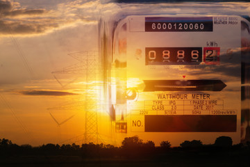 Electricity meter for house with sky background.