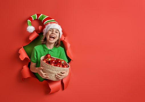 Santa's elf on bright color background