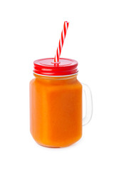 Closeup glass jar of orange carrot juice isolated at white background. Concept of healthy vegan food