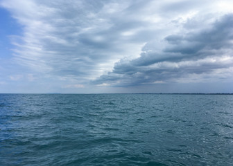 Dark cloud and rain over the ocean