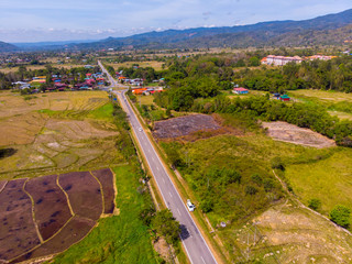 Beautiful Aerial image of rural landscape with beautiful young green paddy field in Tambunan,...