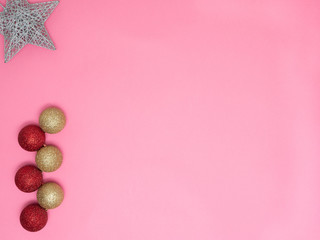 Fototapeta na wymiar Christmas decorations or ornaments isolated on pink background, with copy space, Christmas concept
