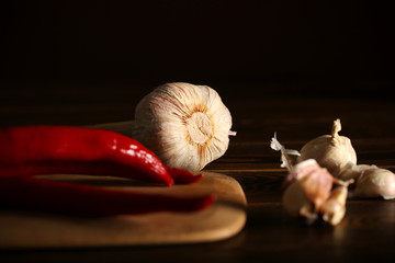 pepper red acute lies on dark backdrop of