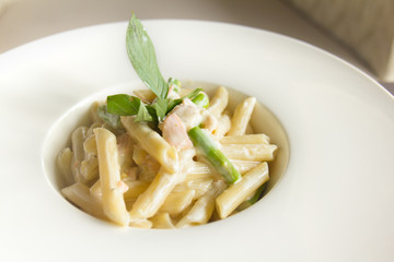 tasty pasta with salmon on a the table