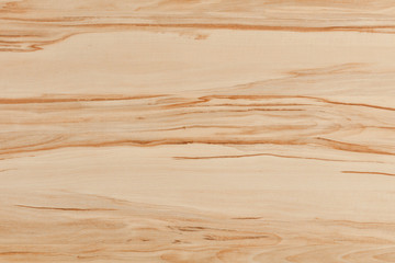 Flat background with wooden desk board top with christmas decorations and ornaments.