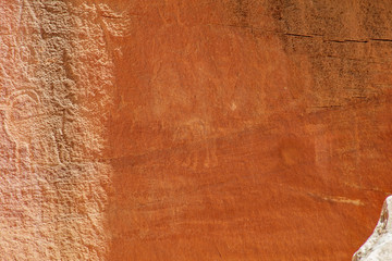 Ancient Fremont People petroglyphs make present day visitor aware of their existence oin the sandstone walls of Capitol Reef National Park, Utan