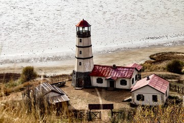 lighthouse on coast of sea