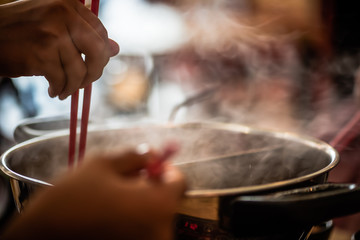 Shabu-shabu is a Japanese nabemono hotpot dish of thinly sliced meat and vegetables boiled in water. The term is onomatopoeic, derived from the sound emitted when the ingredients are stirred 