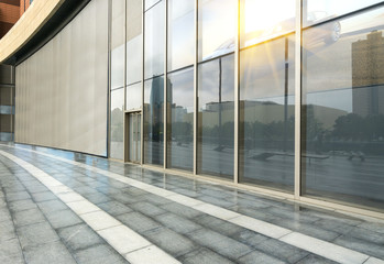 Fototapeta na wymiar Empty Plaza and Modern Office Building, Qingdao, China