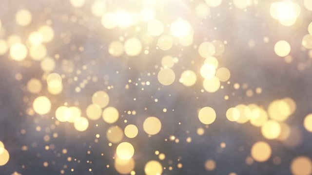 4k video. 60 fps. Warm festive backdrop. Christmas blurred dots. Defocused particles background. Bokeh lights. Gold glitter. 3840x2160
