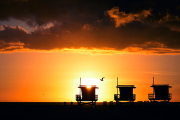 Lifeguard Towers on Beach at Sunset