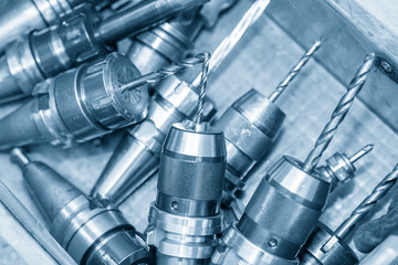 The various type of the hole cutting tools for CNC milling machine in the container box. The face-milling tool, drill, reamer and indexable tool for machining center.