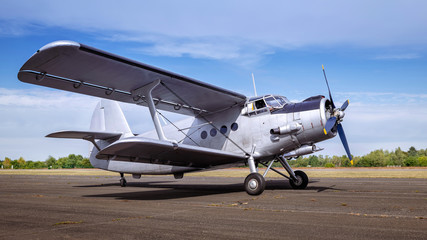 Naklejka premium historical aircraft on a runway