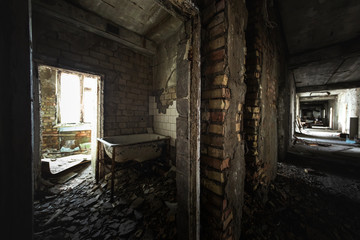 Fototapeta na wymiar Abandoned corridor in Hospital angle shot