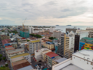 Kota Kinabalu cityscape aerial  photo with fisherman boat parking at Waterfront Kota Kinabalu. Kota...
