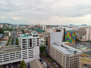 Kota Kinabalu cityscape aerial  photo with fisherman boat parking at Waterfront Kota Kinabalu. Kota Kinabalu is the capital of Malaysia’s Sabah state.