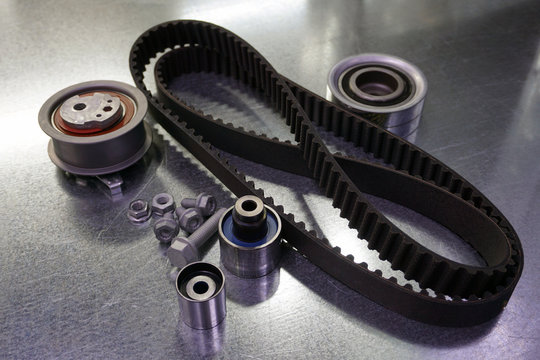 Repair kit for replacing the timing belt. The kit consists of a timing belt, a tension roller, a bypass roller, a set of fasteners. Spare parts for the repair of a modern car.