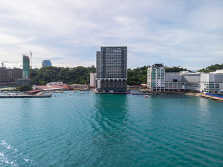 Kota Kinabalu cityscape aerial  photo with fisherman boat parking at Waterfront Kota Kinabalu. Kota...
