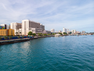 Fototapeta premium Kota Kinabalu cityscape aerial photo with fisherman boat parking at Waterfront Kota Kinabalu. Kota Kinabalu is the capital of Malaysia’s Sabah state.