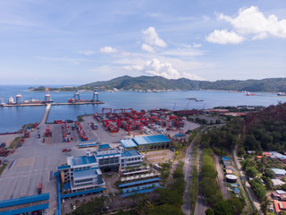 Aerial Image of Logistics and transportation of Container Cargo ship and Cargo plane with working...
