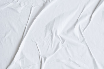 Blank white crumpled and creased paper poster texture background