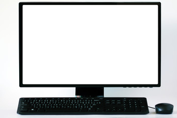 Fototapeta premium Soft focus and blur.Blank white computer screen on white table