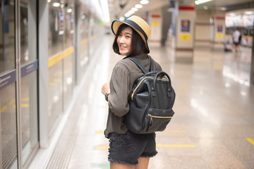 Young Asian travel girl is enjoying with beautiful place in Bangkok, Thailand