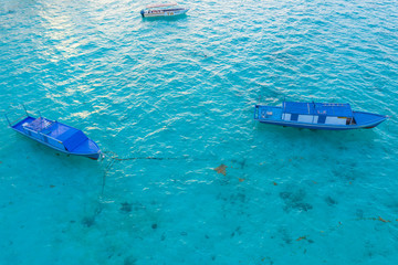 Top view of beautiful wooden jetty with clear sea water at Mantanani Island, Sabah, Malaysia