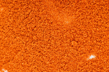 Pile of red paprika powder  background